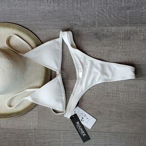 NWT Ruuhee white thong bikini. Size Medium.